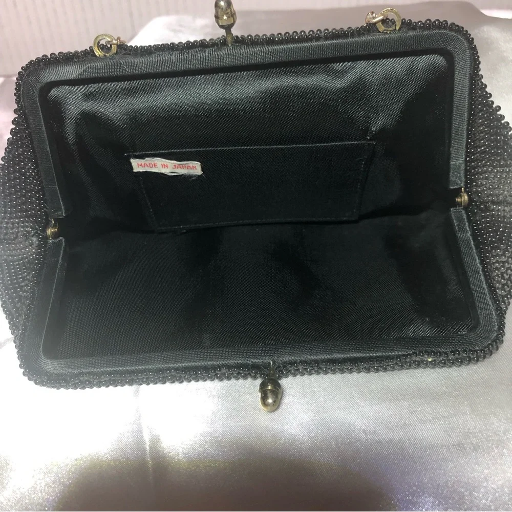 Antique vintage black beaded purse with chain handle.